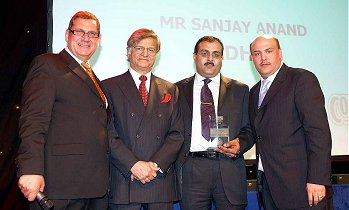 left to right : Pat Chapman, Sir Gulam Noon, Sanjeev Anand, Sanjay Anand